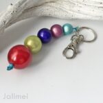Schlüsselanhänger Miracle Bead rot