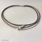 Collier Glitzer Stern navy cognac