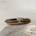 Lederarmband Glitzer in gold-schwarz mit einem Sternchen