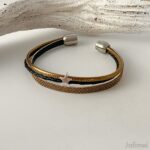 Lederarmband mit Glitzer gold-schwarz mit einem Sternchen