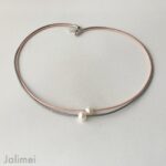 Ledercollier perle rosa-grau