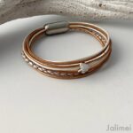 das Lederarmband mit Ginkgoblatt in Bronze-weiss