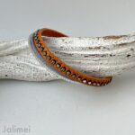 Lederarmband mit Strass in orange