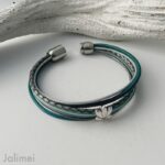 Lederarmband mit Lotusblume in Petrol und grau