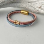 Armband mit Fisch in Gold hellblau-rosa