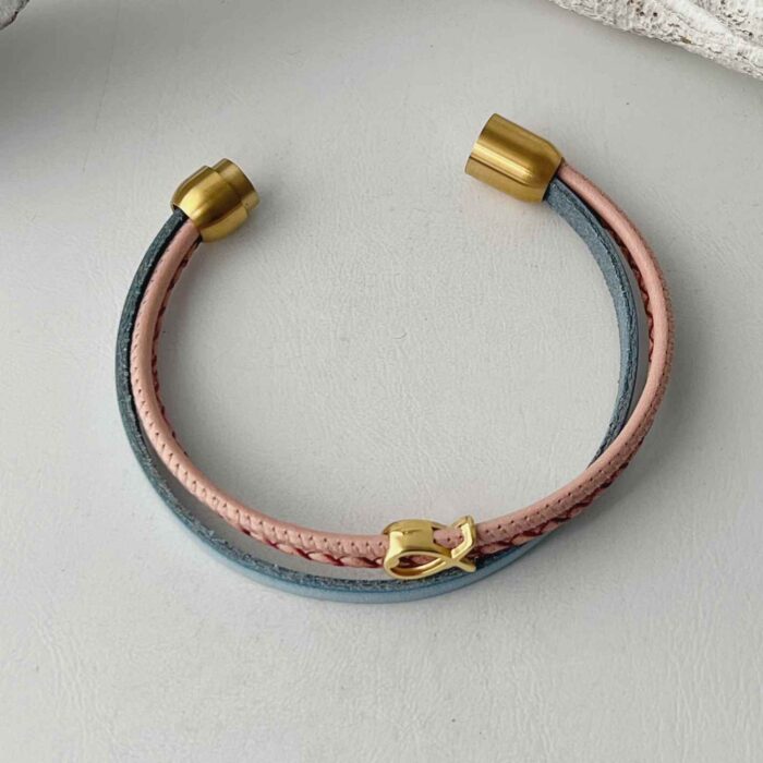 Armband mit Fisch Gold in hellblau-rosa