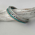 Lederarmband mit Infinity türkis beige