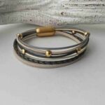 Lederarmband aus Nappa mit Gold in grau beige